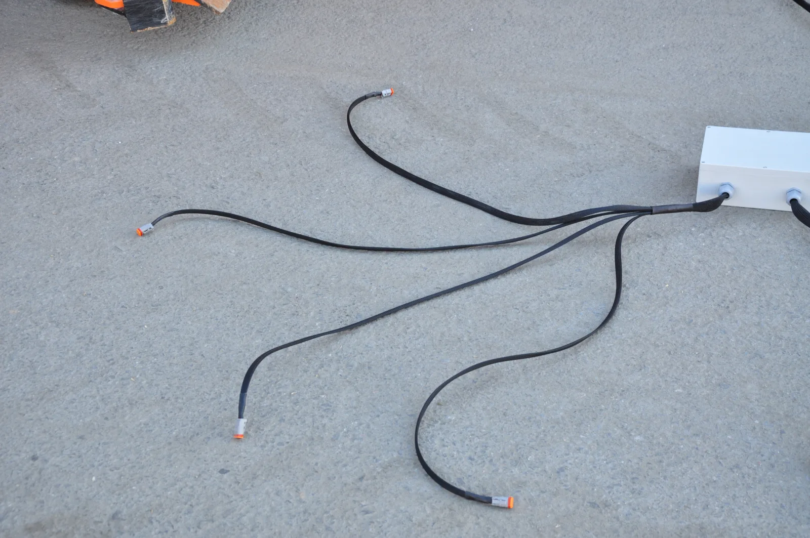 Pre-wired implement-side harness: ISOBUS Block enclosure with four output cables terminated in 2-pin Deutsch connectors